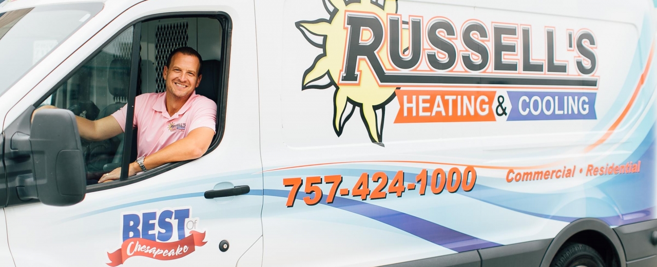 Buddy and white Russell's HVAC van
